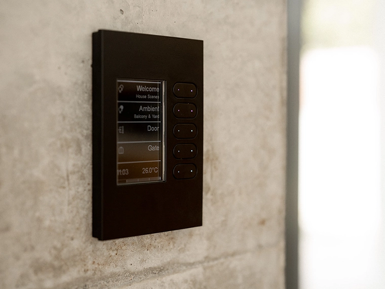 Smart wall control panel on a marble wall