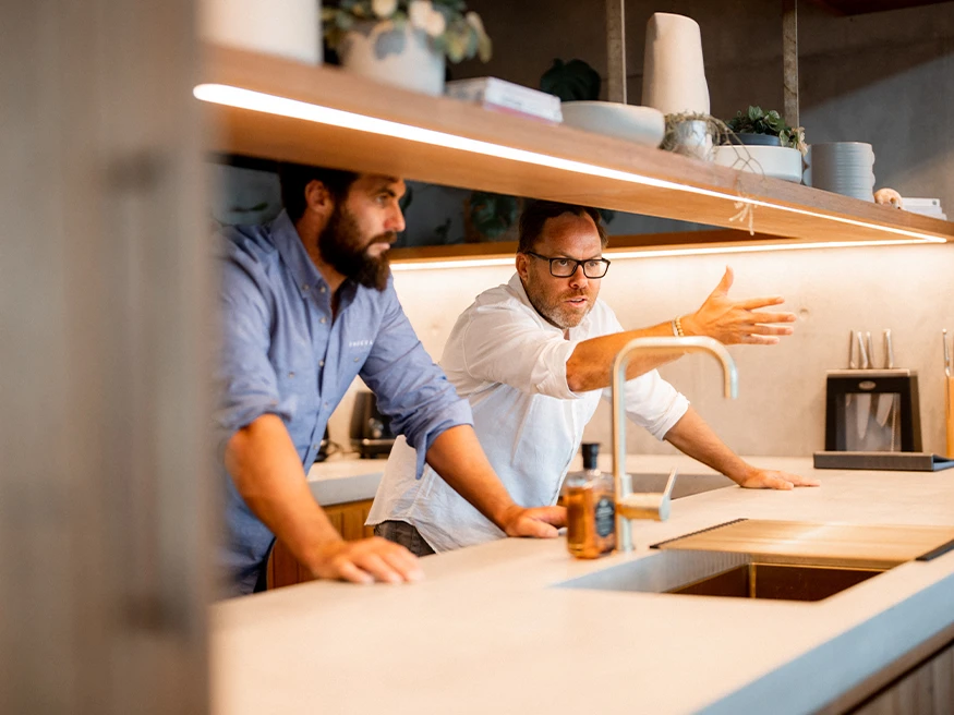 Futureflip director Neil Hipwell and Tom Ryan of Ryelec Automation & Energy discussing in Bunker House.