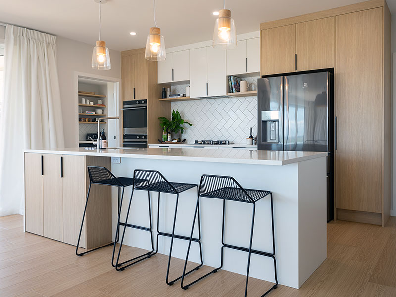 The kitchen and dining room of Clayton and Toni's Beachlands home.