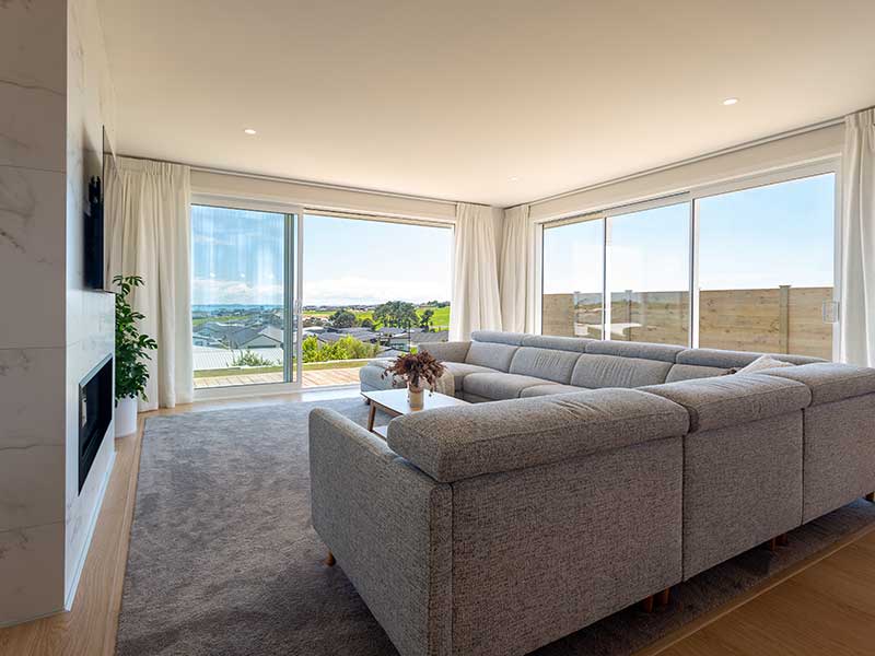 The living room of Clayton and Toni’s Beachlands home in Auckland.