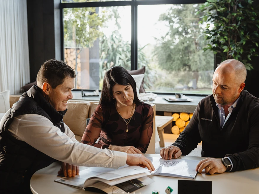 Matt and Jess Corlieson discussing with their electrician.