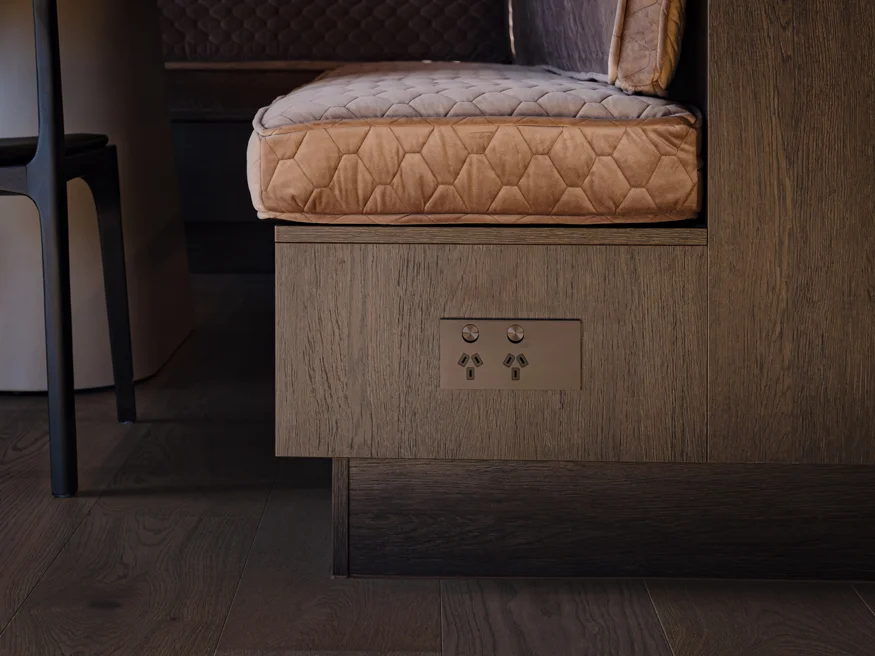A Clipsal Solis Collection power point in Design Builders’ new build mounted on the side of a seat.