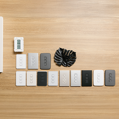 A range of PDL Iconic Collection switches laid out side-by-side on a table.
