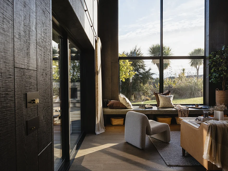 An organic modernist living room with Clipsal Solis switches.