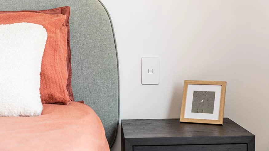 Modern PDL Iconic 1-gang flush switch mounted vertically on a wall