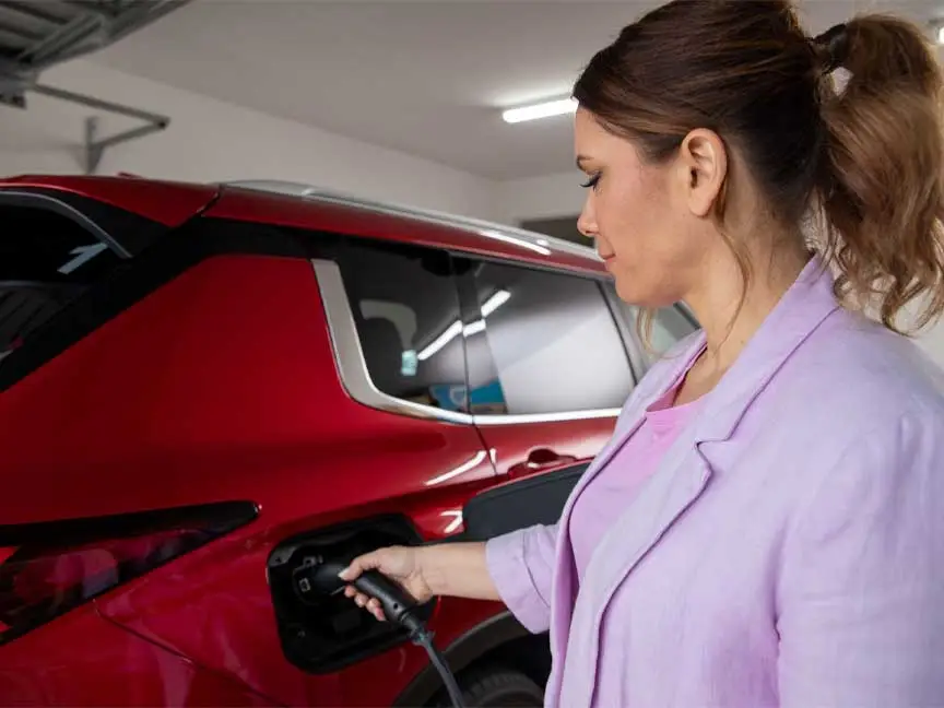 Woman charging car