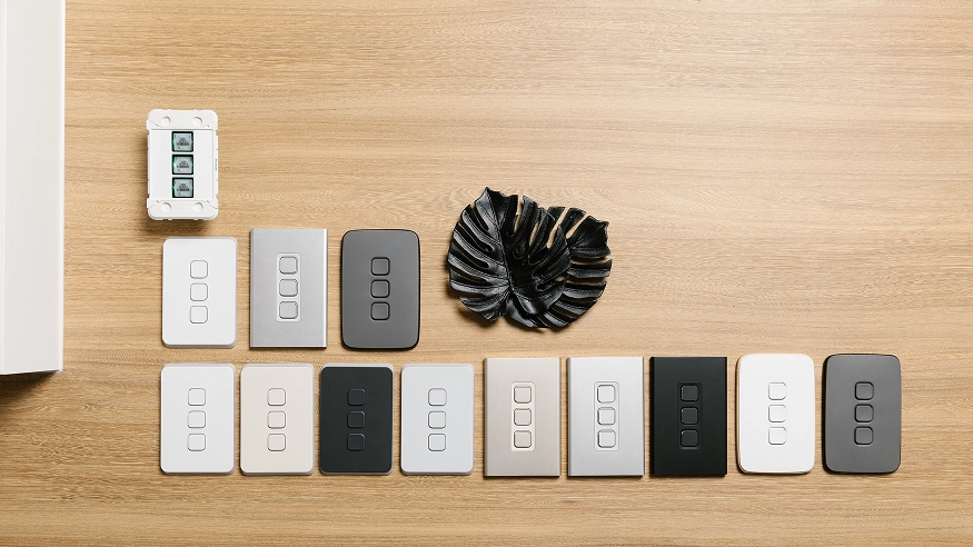 A range of PDL Iconic Collection switches laid out side-by-side on a table.