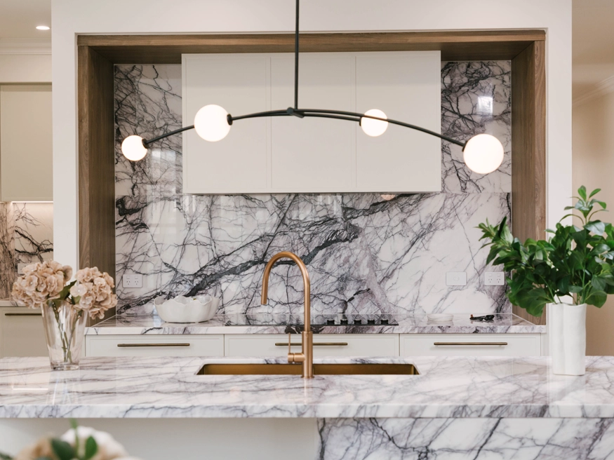 A high-end residential kitchen with two PDL Iconic electrical power points installed by the countertop.