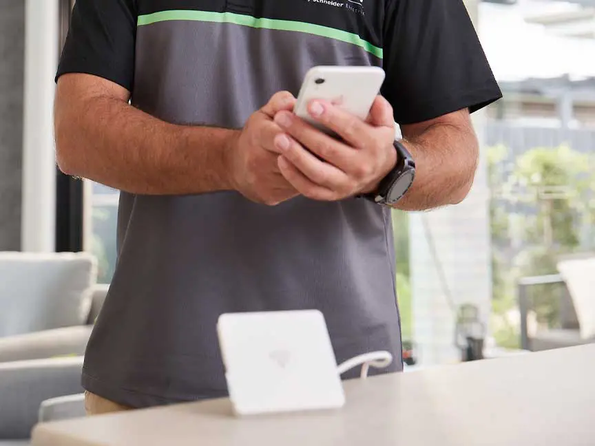 Electrician connecting to Wiser Hub.