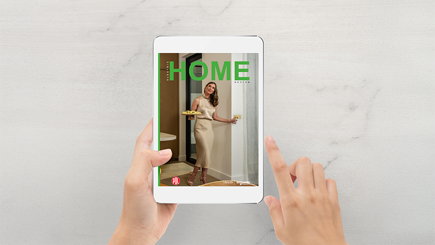 Smiling woman in elegant white dress holding an iPad