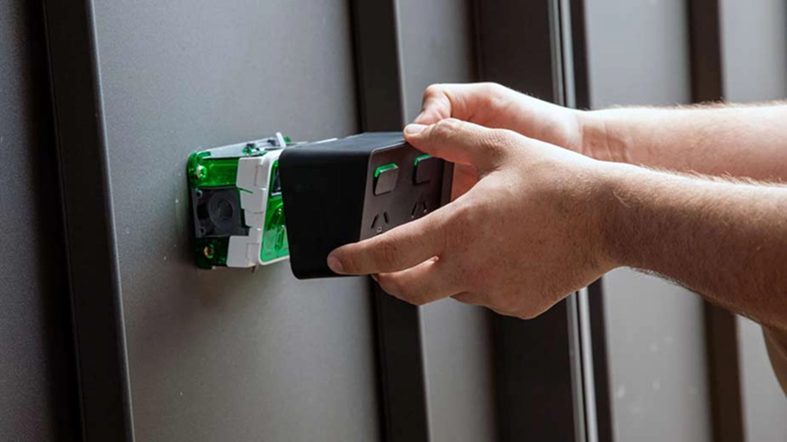 An Iconic Outdoor socket being installed by an electrician.