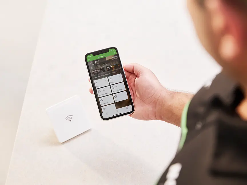 Electrician holding wiser hub.