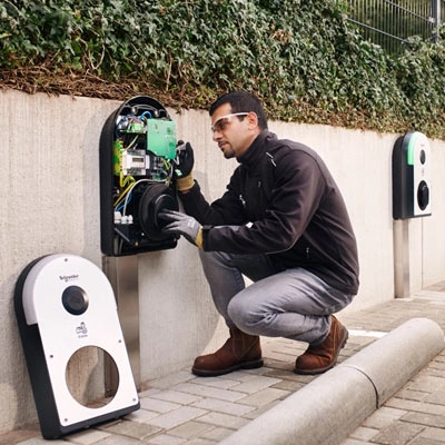Electrician installing Electric Vehicle Chargers