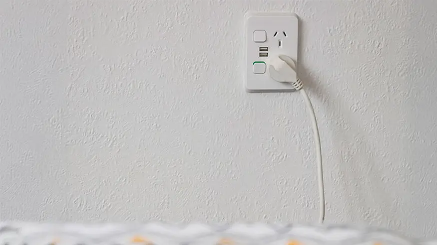 A PDL Iconic™ switched socket with a USB phone charger add-on in Ben and Quinn’s bungalow home.