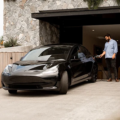Man charging his vehicle