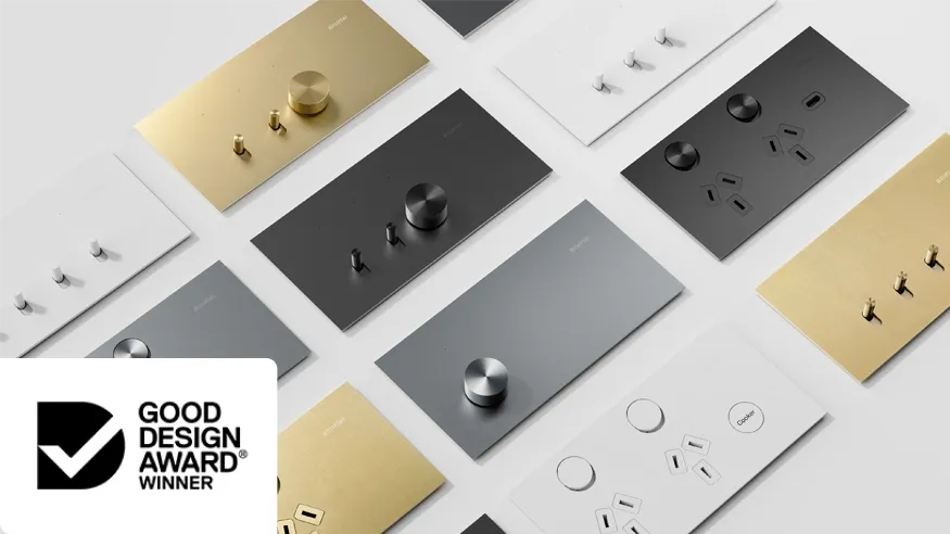 A collection of Clipsal Solis Collection switches and power outlets with the Good Design Award logo.