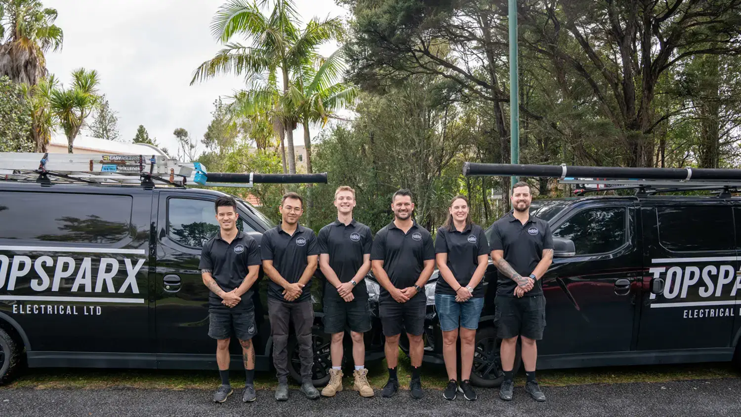A group photo of electricians from Top Sparx Electrical.